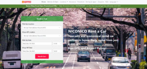 Screenshot of NICONICO Rent a Car top page. Shows a car reservation box and a sakura blossom background.
